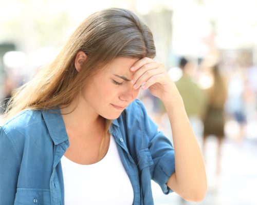 Painful,Girl,Suffering,Headache,Standing,In,The,Street